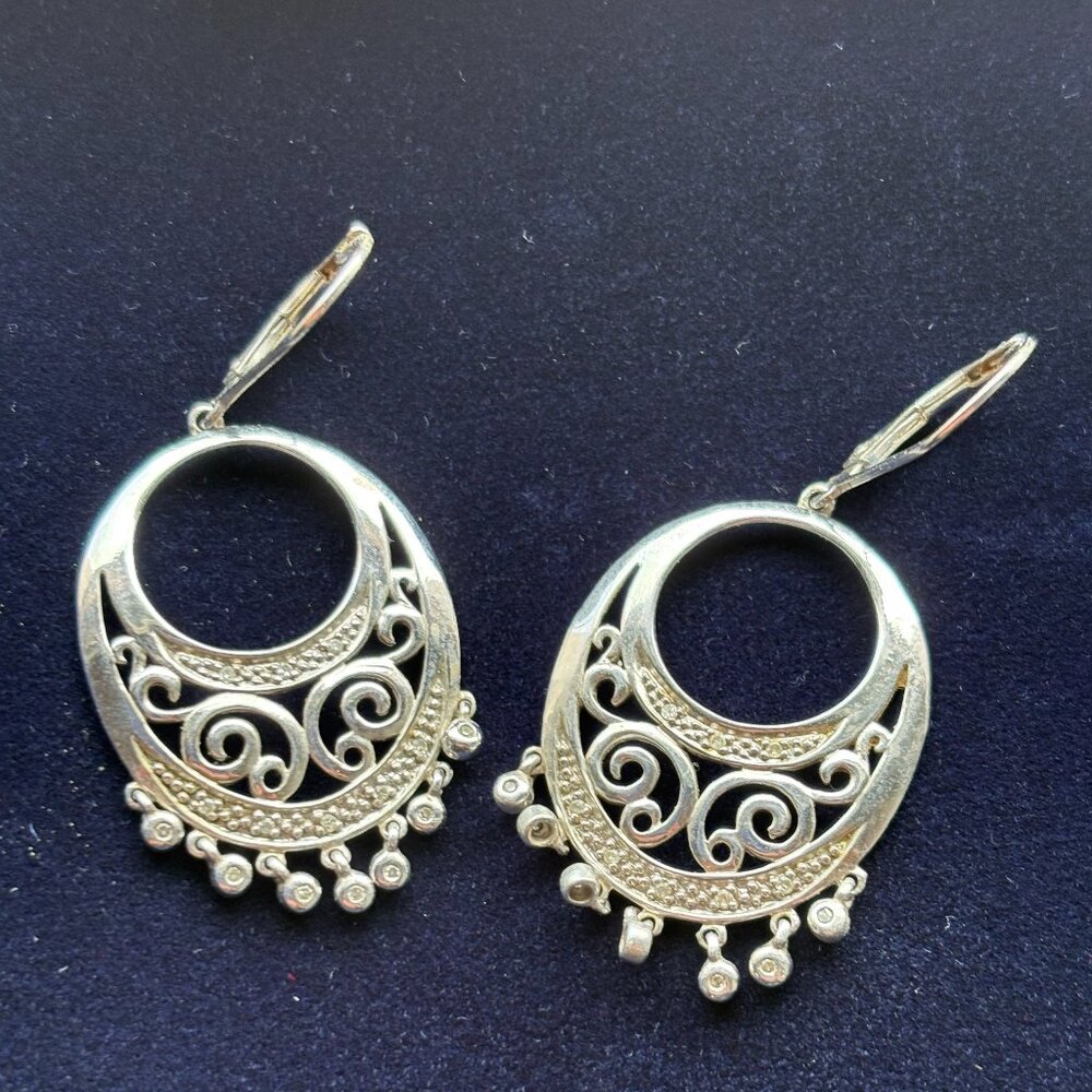 Sterling Silver dangle earrings with diamond accents